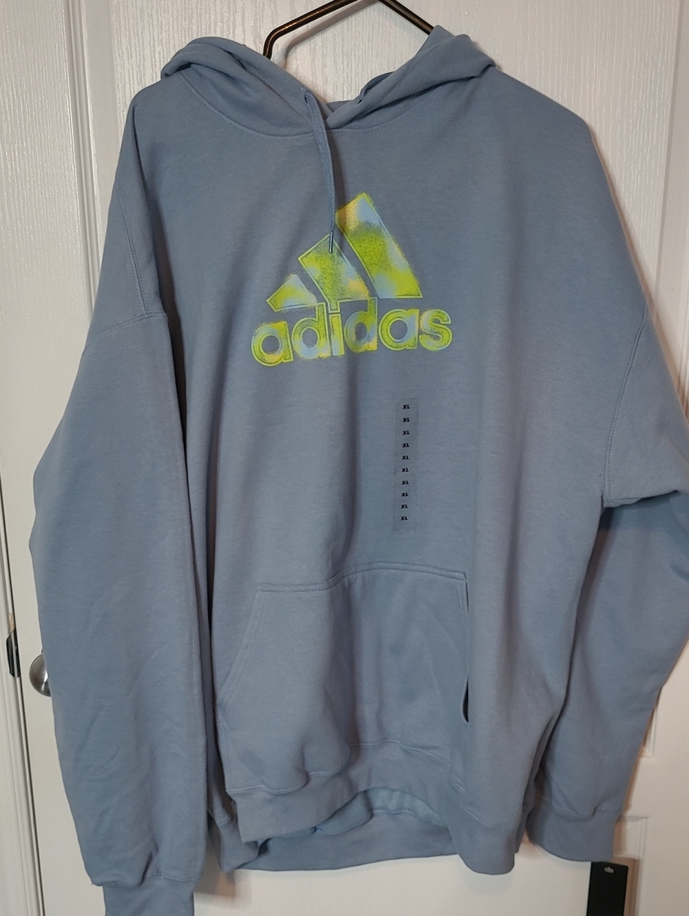 Adidas Light Blue Hoodie with Neon Yellow-Green Logo